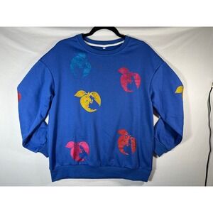 blue crewneck‎ sweatshirt with glittery, multi-colored apple-shaped logos. SMALL